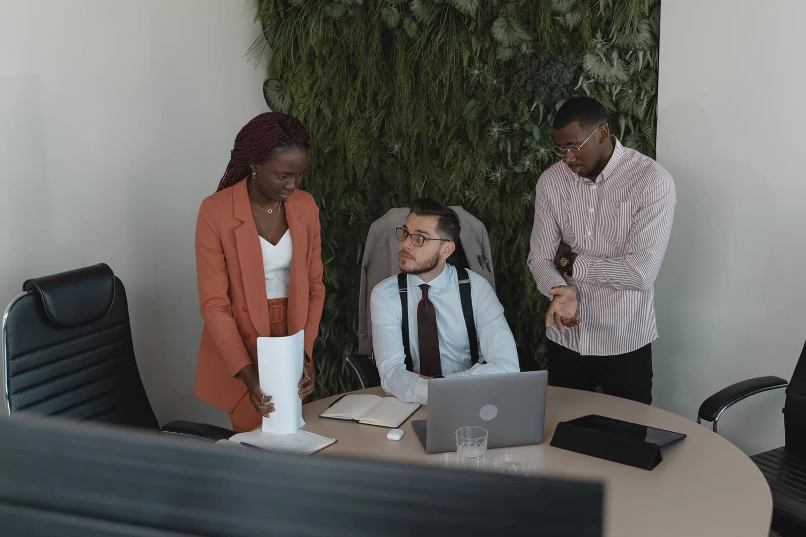 A professional team discussing a staffing requirement